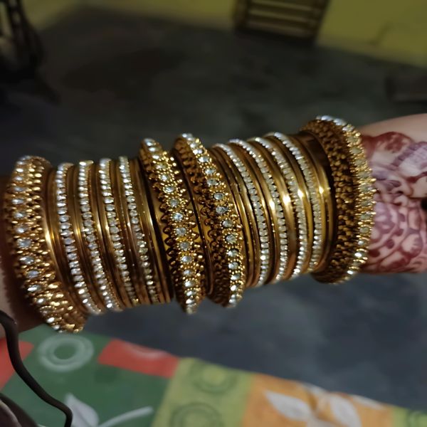 Gold Oxidized Bangles with American Diamond Brilliance – Elegance Redefined as Timeless Beauty meets Modern Twist.