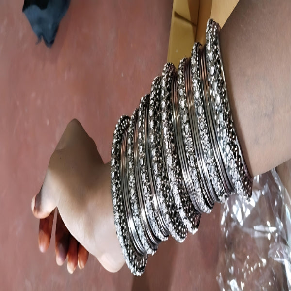 Silver Oxidized Bangles with American Diamond Brilliance – Elegance Redefined as Timeless Beauty meets Modern Twist.