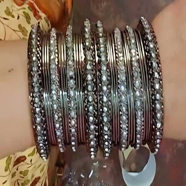 Silver Oxidized Bangles with American Diamond Brilliance – Elegance Redefined as Timeless Beauty meets Modern Twist.